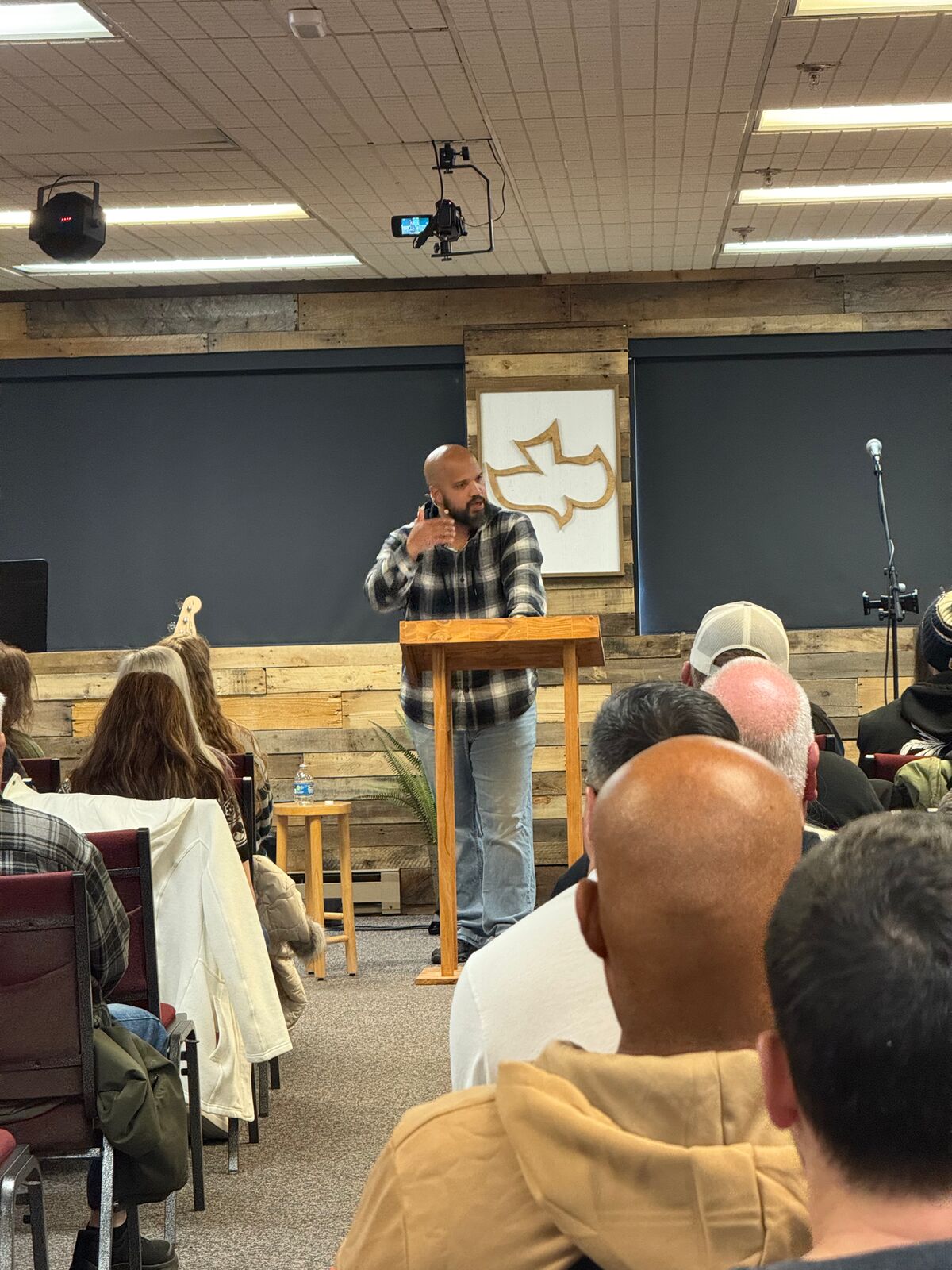 Pastor teaching from the Bible